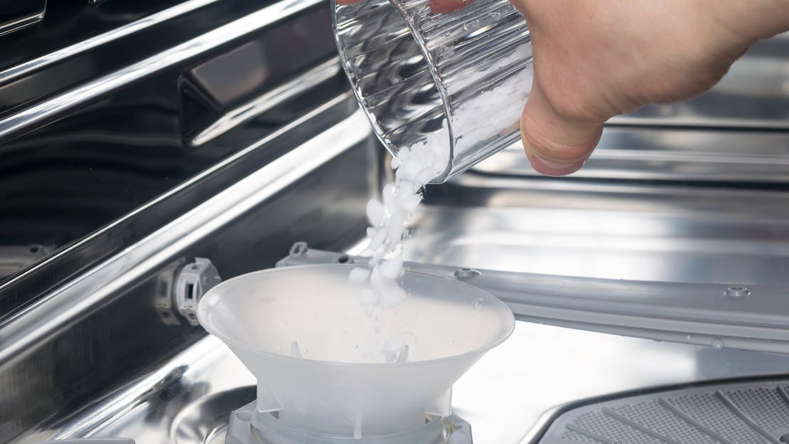 What is dishwasher salt and what does it do